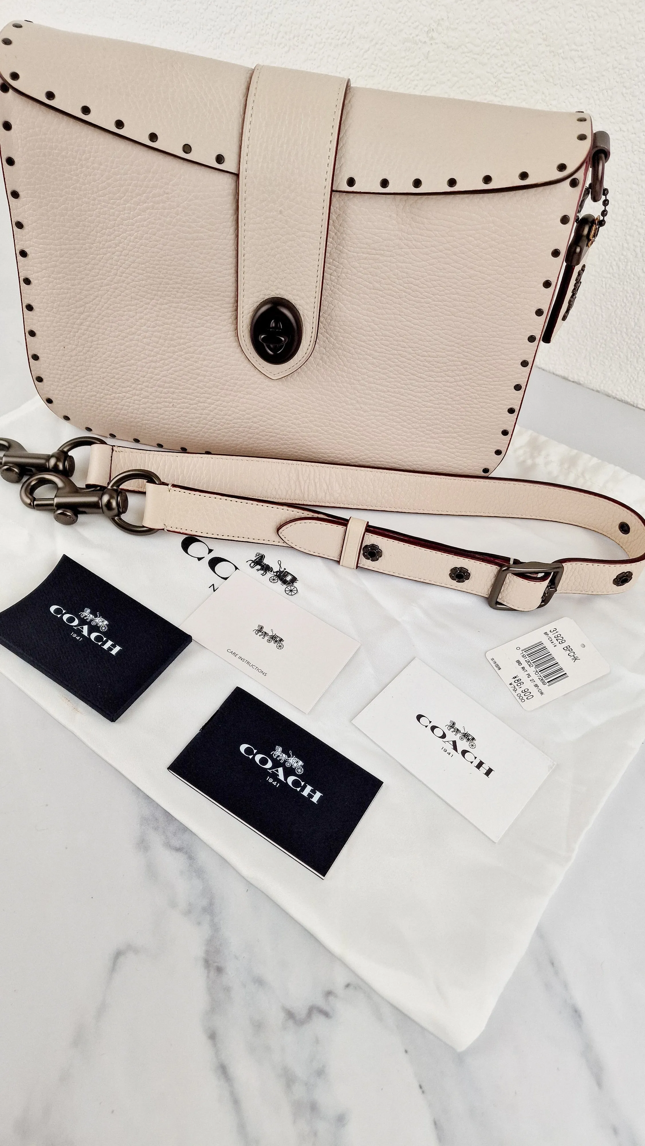 Coach 1941 Page 27 With Border Rivets in Chalk White Pebble Leather - Coach 31929